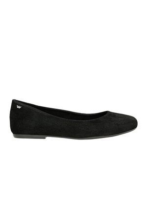 Black suede ballet flats featuring a rounded toe, flat black sole, and a small white logo on the heel. Smooth texture throughout.