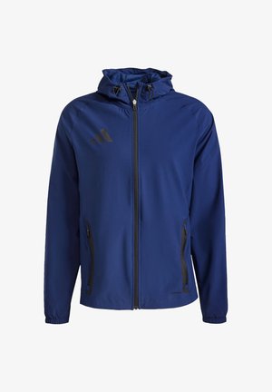 Blaues Sportjacke mit Kapuze, schwarzen Reißverschlusstaschen und schwarzem Logo. Glattes Material mit elastischen Bündchen und verstellbarem Kordelzug an der Kapuze.