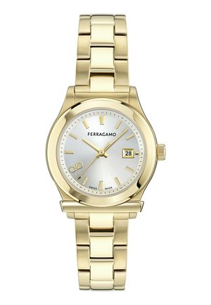 Ceas de mână Ferragamo în ton auriu, cu cadran argintiu, markeri aurii, afișaj pentru dată la ora 3 și brățară metalică cu zale.