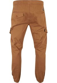 Pantalon cargo marron avec poignets élastiques, poches latérales à rabat et poches arrière, vu de dos.