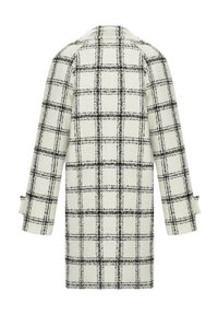 Long manteau en laine blanc avec motif à carreaux noirs, manches longues et col, vu de dos.