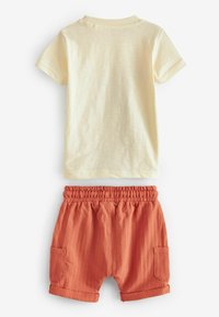 Next CHARACTER SET REGULAR FIT - Jogginghose - cream jungle appliqué