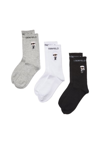Trois paires de chaussettes en coton : grises, blanches et noires. Chacune présente un graphique d'une figure stylisée et le texte "GERFELD" sur la bordure.