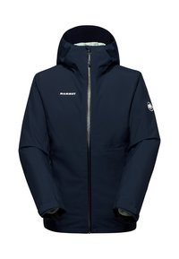 Giacca impermeabile blu navy con cappuccio, zip frontale completa, logo Mammut sul petto e sulla manica, rivestimento interno isolato.
