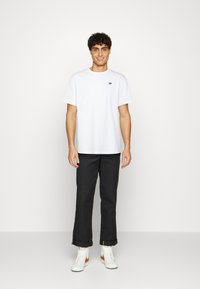 Puma DOWNTOWN TEE - T-shirt basic - puma white