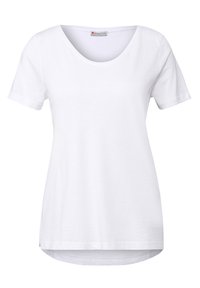 Hvid kortærmet t-shirt med rund halsudskæring, blød tekstur, afslappet pasform og let buet kant forneden. Brandmærket er synligt indeni.