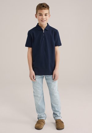Vaqueros tapered - light blue