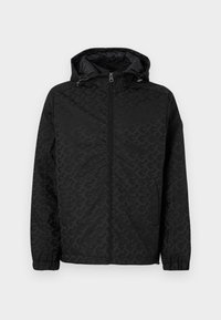 Chaqueta negra con capucha, que cuenta con un patrón texturizado, cierre de cremallera y puños elásticos. Acabado suave con bolsillos laterales para almacenamiento.