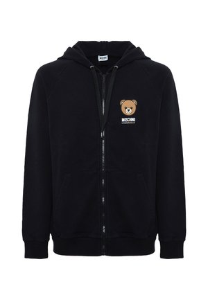Felpa nera con zip, tasche frontali, cappuccio con coulisse e piccolo logo dell'orso marrone con la scritta "Moschino Underbear" sul petto.