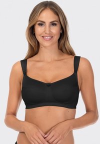 Czarny bezprzewodowy biustonosz wykonany z miękkiego materiału, z szerokimi regulowanymi ramiączkami i ozdobną kokardką na środku. Gładki design bez widocznych szwów.