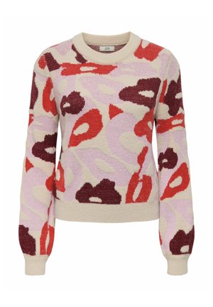 Strickpullover in Creme mit einem abstrakten Muster aus roten, kastanienbraunen und fliederfarbenen Formen. Runder Halsausschnitt und gerippte Bündchen.