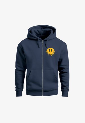 Marineblauer Reißverschluss-Hoodie aus weichem Material, mit einem gelben Smiley-Gesicht-Graphic und gestickten Akzenten auf der Vorderseite sowie vorderen Taschen.