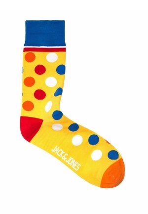 Calzino giallo con dettagli blu, caratterizzato da pois multicolori in rosso, blu e bianco. Nome del brand stampato in bianco sulla punta.
