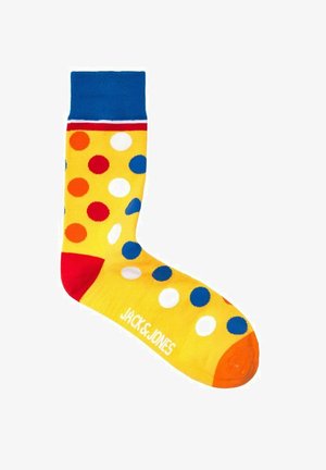 Calzino giallo con dettagli blu, caratterizzato da pois multicolori in rosso, blu e bianco. Nome del brand stampato in bianco sulla punta.