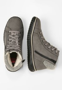 Gray high-top boots made of leather, featuring a fuzzy lining, textured rubber sole, side zipper, and contrasting gray accents.