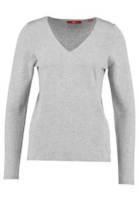 Maglietta grigia a maniche lunghe con scollo a V realizzata in materiale morbido e leggero. Caratterizzata da un design semplice con una superficie liscia e senza motivi visibili.