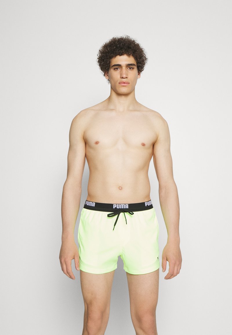 Puma - SWIM MEN LOGO LENGTH - Peldēšanas šorti - fast yellow, Palielināt