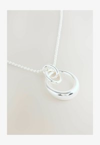 Selezionato, silver tone