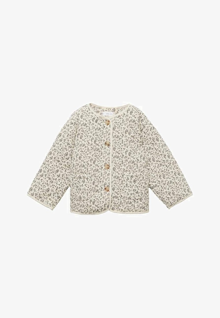 Steppjacke in Creme mit einem kleinen Blumenmuster. Hat einen runden Ausschnitt, lange Ärmel und vier Holzknöpfe. Enthält Seitentaschen.