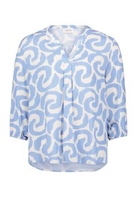 Blusa azzurro chiaro con un motivo astratto bianco a spirale, scollatura a V, maniche tre quarti con polsini arricciati e vestibilità ampia.