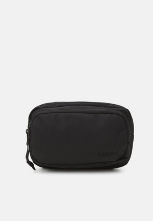 Trousse rectangulaire noire zippée avec deux compartiments et languettes en tissu, design simple sur fond blanc.