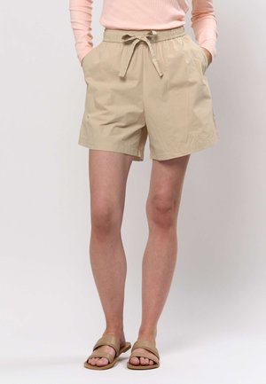 Beige shorts med elastisk linning og snøre. Har to sidelommer og en afslappet pasform. Glat, letvægtsstof.