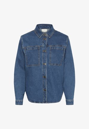 Nööpe kinnitatav denimist särk, millel on sinine pesu, kaks rinna taskut, terav krae ja pikad varrukad nööpidega. Tekstureeritud kangas.