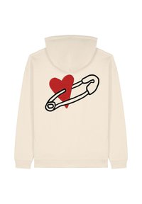 Felpa beige con un grande cuore rosso e un design di spilla da sicurezza ricamato sul retro. Tessuto morbido con una vestibilità classica e cappuccio.