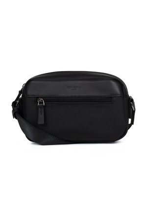 Czarna torba na ramię z zasuwaną przednią kieszenią, regulowanym paskiem i subtelnym logo marki na gładkim górnym panelu.