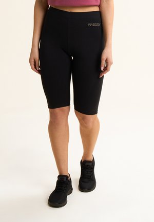 CON LOGO PERLINE - Leggings - black