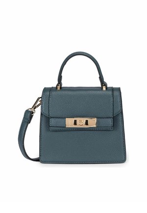 Petit sac à main en cuir bleu sarcelle foncé avec poignée supérieure, bandoulière amovible et fermeture à tour rectangulaire dorée sur le rabat avant.