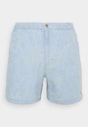 Vaaleansiniset pellavashortsit, joissa on joustava vyötärönauha, nappisuljenta ja pieni sivukäänne.