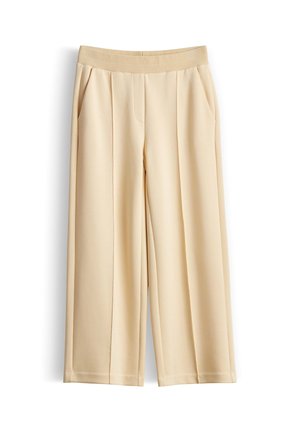 Pantaloni beige a gamba larga con vita elastica e pieghe frontali, dotati di tasche laterali e finitura del tessuto liscia.