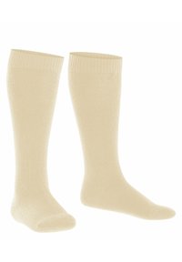 Jas-beżowe skarpetki do kolan, wykonane z gładkiego materiału, z ribbrowanym mankietem na górze i bezszwowym palcem dla wygody.