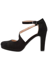 Chaussure à talon haut en daim noir avec un bout arrondi, une bride ajustable à la cheville et une plateforme à l'avant. Dotée d'une texture lisse et d'un design élégant.