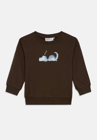 Temno rjava dolgo rokavi otroška majica s svetlo modrim risanim dinozavrom, ki spi, in "zzz" nad njegovo glavo na prsih.