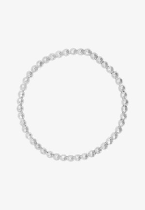 Bracelet en argent perlé composé de perles métalliques lisses et brillantes de forme ronde. Présente des surfaces de perles alternant entre facettées et lisses.