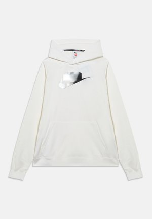 Sweat à capuche blanc avec poche avant et logo Nike swoosh argenté réfléchissant combiné à un design en blocs sur la poitrine.