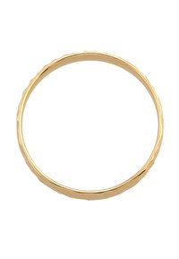 Gold bangle with a polished finish and a wavy edge design. Circular shape with a round cross-section and smooth texture.