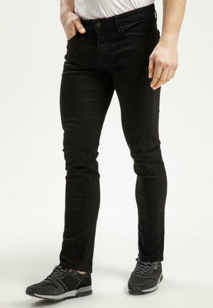 - Jeansy Slim Fit