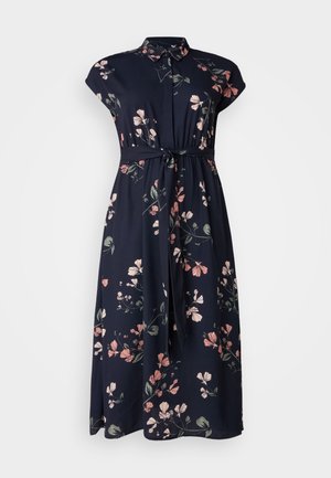 Vestido floral azul marino con mangas cortas, cuello de camisa, cinturón en la cintura y patrones de flores en tonos rosa claro y verde a lo largo. Tejido suave.