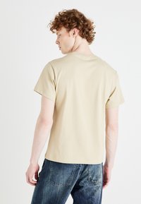 Weekday BOXY GRAPHIC TEE - Printtipaita - beige