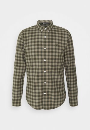 Overhemd met lange mouwen en knopen, groen-beige ruitpatroon, knoopkraag en muscle fit-label.