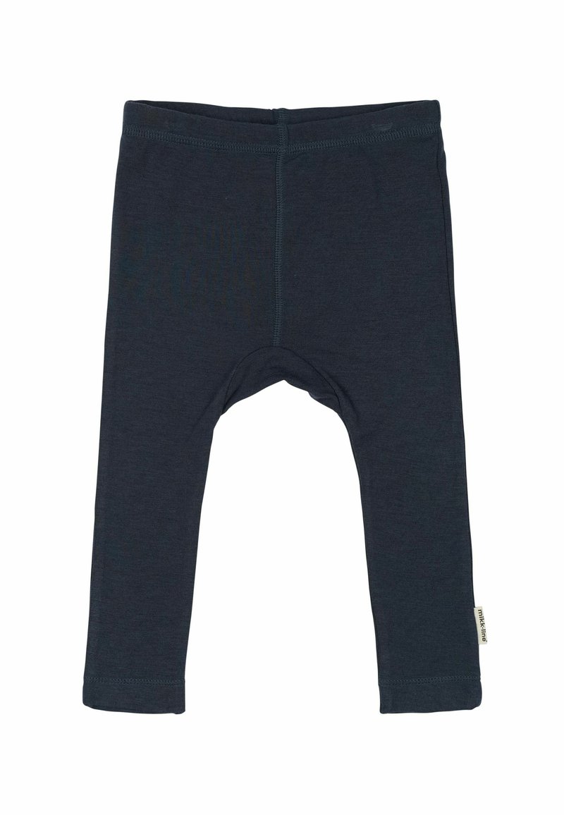 Temno modri leggingi iz mehkega materiala. Imajo oprijet kroj, ravne hlačnice in dolžino do gležnjev z majhno oznako na robu.