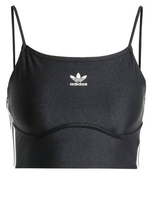Débardeur court noir Adidas avec fines bretelles, logo blanc et les trois bandes signature sur les côtés, fabriqué en tissu lisse.