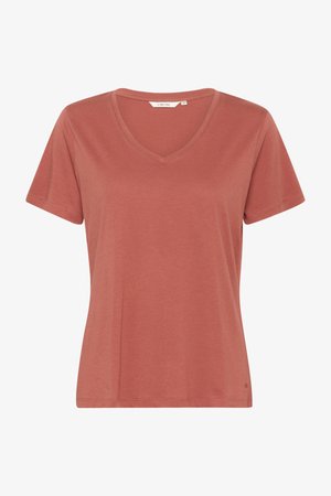 Lühikeste varrukatega V-kaelusega t-särk vaigistatud terrakota värvuses. Valmistatud pehmest kangast ja juhusliku lõikega. küljes on väike brändimärgis.