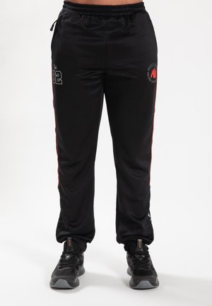 BROXTON - Tracksuit bottoms - black