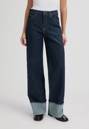 STELLA - Bootcut jeans - xion