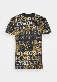 Svart t-shirt med vita och goldgrekiska nyckelmönster och text, med rundad hals och korta ärmar. Bomullsblandat material.