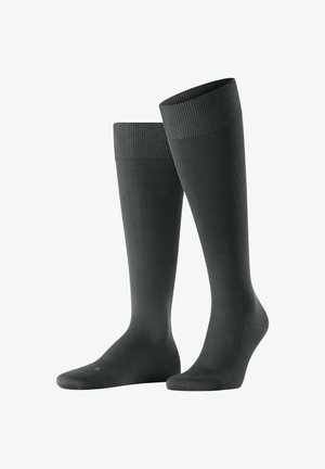 Sosete gri închis până la genunchi, fabricate dintr-un material ribbed. Au un mansetă elastică și o textură netedă, cu vârf și călcâi întărite.